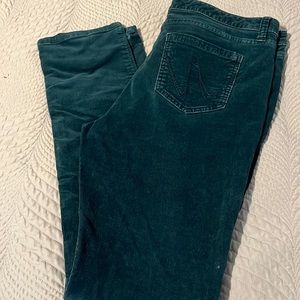 Teal skinny leg cords.